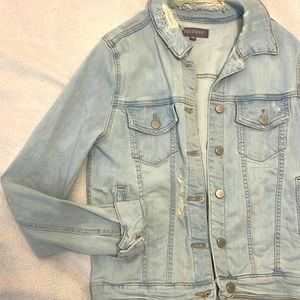 Distressed denim jacket
